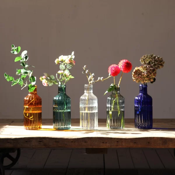 display of blue bottle vases